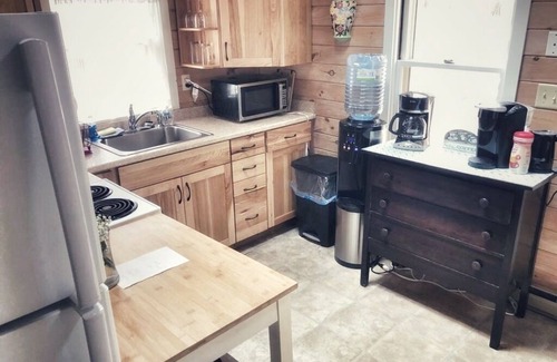 Norway Cabin | Charming Camp with an upstairs loft and wrap around deck. Near the Lake!