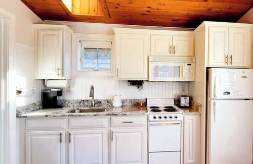 West Yarmouth Cottage | Charming Cape Cod Waterfront Cottage Perfect for 2! 1 minute walk to the beach!