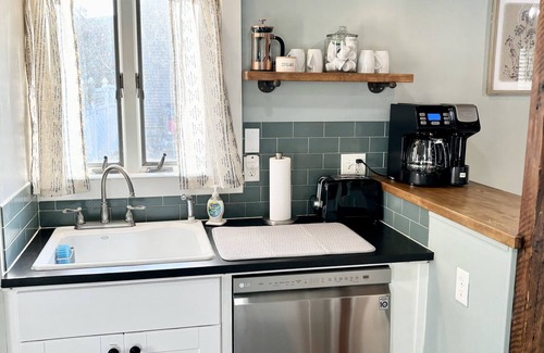 Woodstown Cottage | Charming century-old tiny home in historic town with gym membership included!