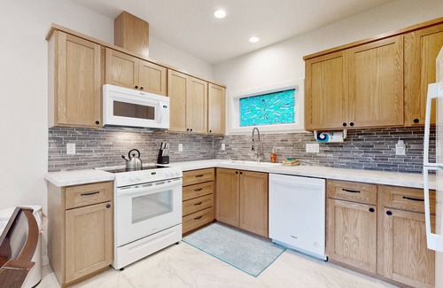 Rockaway Beach House | Charming coastal retreat near the beach with smart TV, fireplace, & games