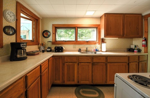 Bridgton Cottage | Charming cottage just 12' from the water's edge with gorgeous sunrise views!