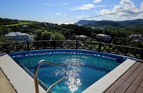 Cap Estate House | Charming cottage located in Cap Estate - Orchid Cottage home