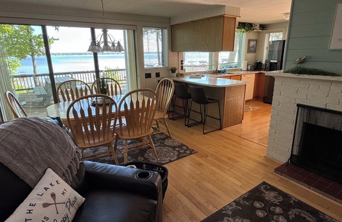 Lake City Cottage | Charming Cottage on Sandy Beach with Beautiful Lake Views from Large Deck