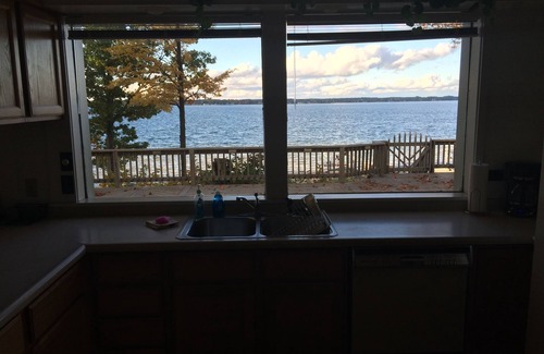 Lake City Cottage | Charming Cottage on Sandy Beach with Beautiful Lake Views from Large Deck