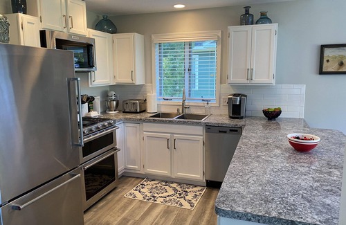Elk Rapids House | Charming Cottage on Elk River in Elk Rapids – Your Summer Getaway Awaits!