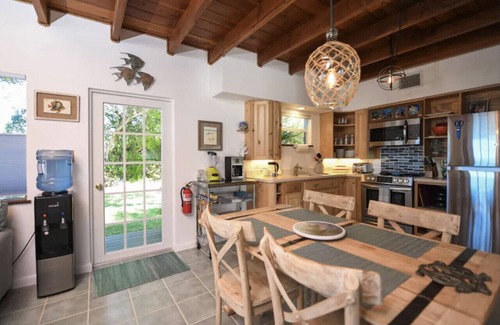 Islamorada Cottage | Charming cottage on the Florida Bay in the heart of Islamorada with pool, dockage, beach + more