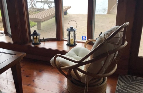 Sodus Point Cottage | Charming Cottage on the Bay and Golf Course with private patio and boat dock.