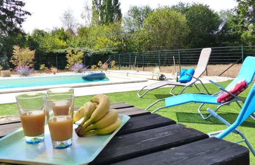Target Cottage | Charming Cottage with Shared Pool, Garden, and Modern Amenities in Tranquil Village Setting
