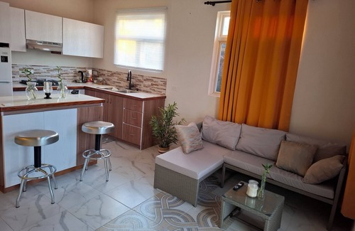 West Coast Apartment | Charming cozy 1-bedroom apartment in fabulous Cottage St. George with WiFi, AC