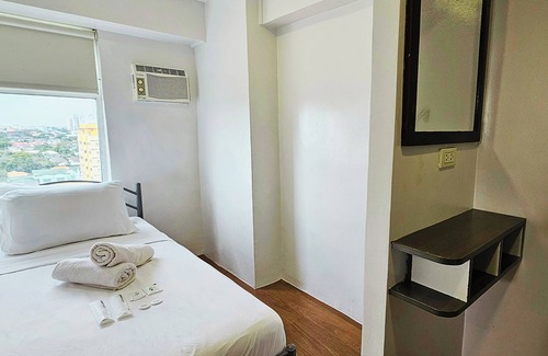 Valencia House | Charming & Cozy 3-bedroom with WiFi in Quezon City