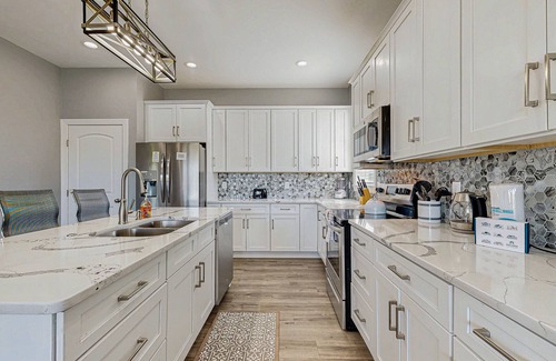Orange House | Charming dog-friendly lakefront villa with private dock, firepit, stunning views