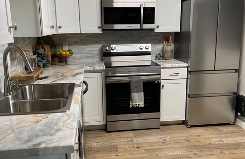 Delta House | "Charming downtown retreat!