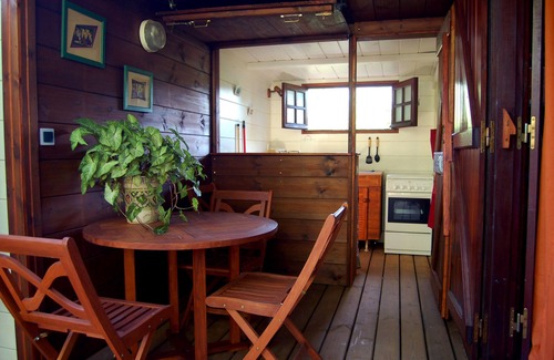 Maniron House | Charming exotic wood bungalow with pool in a tropical garden.