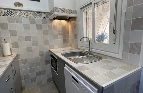 Miami Platja House | Charming Family Townhouse with Private Patio in Miami Playa