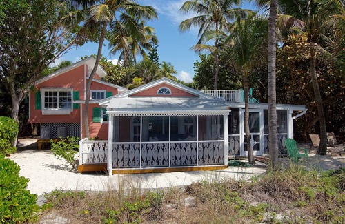 Captiva Cottage | Charming, First Class, Fenced and Gated, Truly Beachfront! Golf cart included.