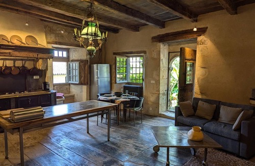 Beaulieu-sur-Sonnette Cottage | Charming Restored 15th-Century Priory with Modern Comfort, Fireplace, and Private Garden