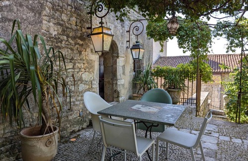 Beaulieu-sur-Sonnette Cottage | Charming Restored 15th-Century Priory with Modern Comfort, Fireplace, and Private Garden