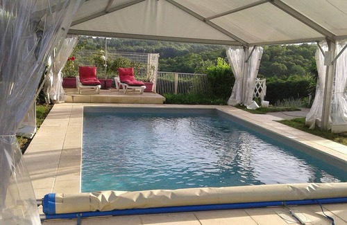 Sarlande Cottage | Charming gîte 30° indoor pool Jacuzzi Sauna. Electric charging station