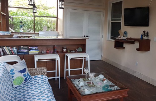 Leeward Settlement Cottage | Charming Garden Cottage on the canal in Leeward
