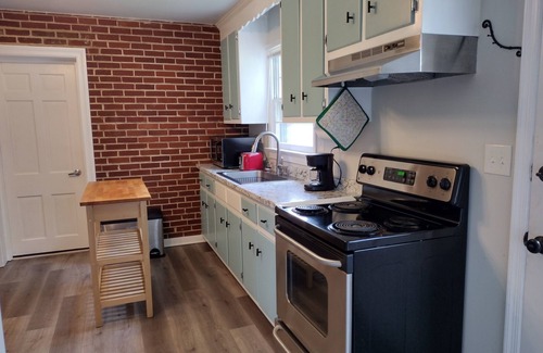 Chesterfield House | Charming Garden Corner with large fenced yard.