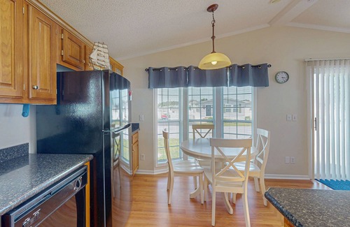 Assateague Pointe House | Charming getaway with modern amenities, tennis court, pool, & private patio