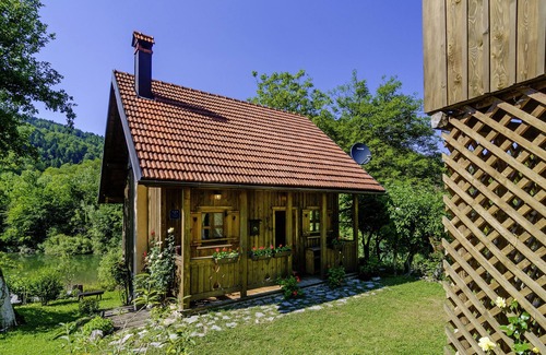 Delnice House | Charming holiday home with 2 bedrooms in an idyllic location, garden with barbecue pavilion, only 20 m from the beach on the river Kupa
