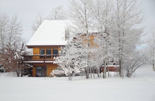Driggs Cabin | Charming home on Ski Hill Road with lush landscaping and a new hot tub.