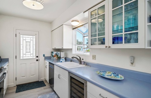 Park Hill House | Charming Home on the Hill with Ocean Views - two Queen beds and one full bed