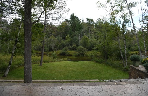 Grayling House | Charming Home on the mainstream of the Au Sable River.