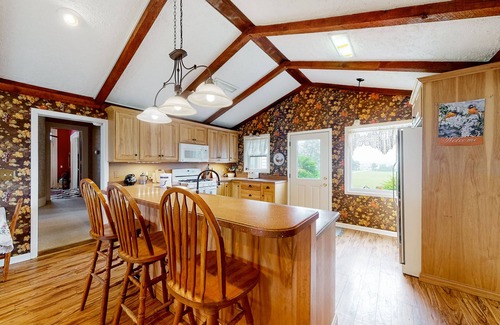 Penn Yan House | Charming home with firepit, skiing nearby, full kitchen, central AC, & W/D