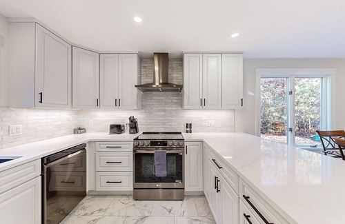 Lagoon Heights House | Charming home with private hot tub, firepit, deck, grill, outdoor shower, AC