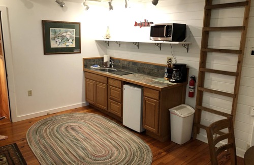 Suttons Bay House | Charming Horse Farm Country Cottage on Rolling Hills