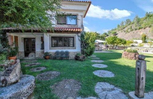 Sao Joao Batista House | Charming House in Porto de Mós with Shared Pool