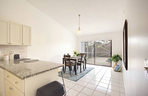 Villages of Palm Beach Lakes House | Charming House Heated Pool BBQ Beach Nearby