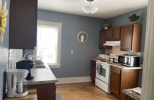 Escanaba House | Charming house walking distance to restaurants -1.7 miles to beach!