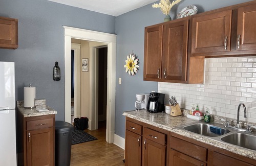 Escanaba House | Charming house walking distance to restaurants -1.7 miles to beach!
