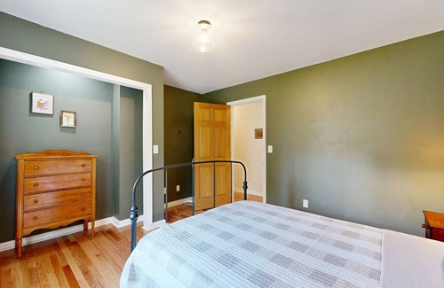 Necedah House | Charming house with enclosed yard, board games, deck, & firepit
