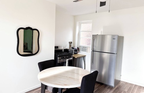 Troy Apartment | Charming king size bed, 2 multi use rooms apartment in Troy , WiFi. Laundry.