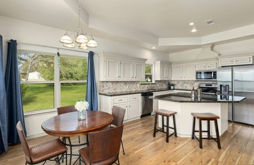 West Livingston House | Charming lake-view 3 bedroom home on Livingston - gated community. Pet friendly!