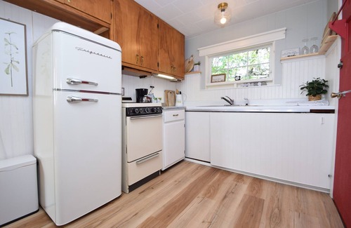 Webster Cottage | Charming Lakeside Cottage nestled on 40 private, wooded acres on Big Sand Lake