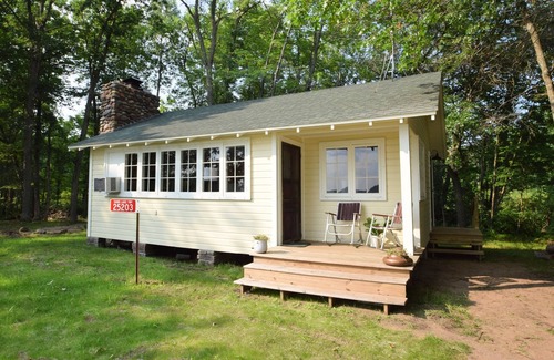 Webster Cottage | Charming Lakeside Cottage nestled on 40 private, wooded acres on Big Sand Lake