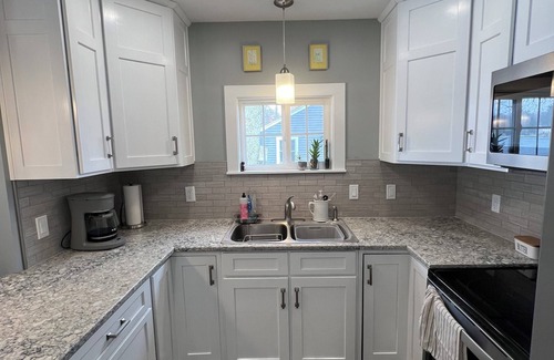 Grant Cottage | Charming lakeside cottage on all-sports lake with private beach & dock