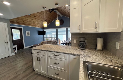 Grant Cottage | Charming lakeside cottage on all-sports lake with private beach & dock