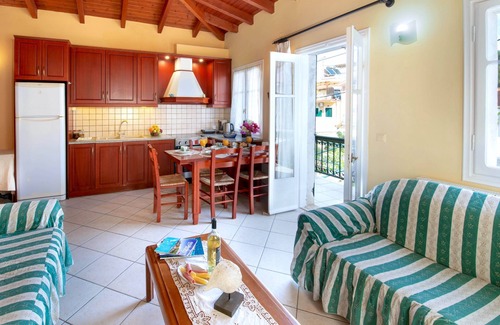 Lakka House | Charming Lakka Retreat: Angelina Apartment with A/C and Central Square Balcony