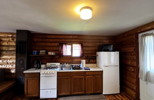 Crystal Falls Cabin | Charming log cabins on Paint River - Pet Friendly!