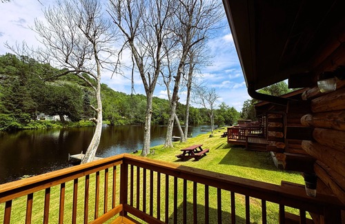 Crystal Falls Cabin | Charming log cabins on Paint River - Pet Friendly!