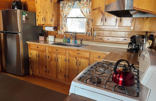 Jackman Cabin | Charming log cabin on Big Wood Pond in Jackman, Maine