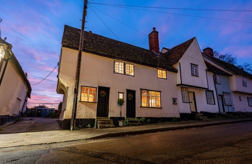 Ipswich Cottage | Charming medieval cottage courtyard garden and wood burner in serene Kersey