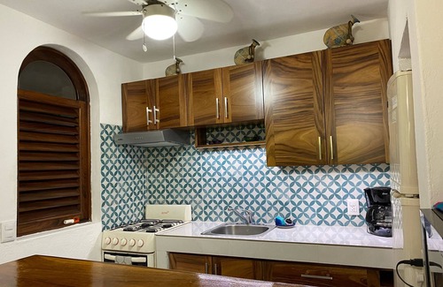 North Hotel Zone Condo | Charming Mexican Style Condo, across the street to the beach!