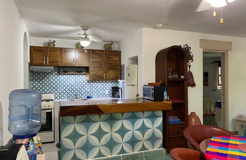 North Hotel Zone Condo | Charming Mexican Style Condo, across the street to the beach!